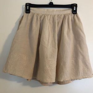 Beige mini skirt
